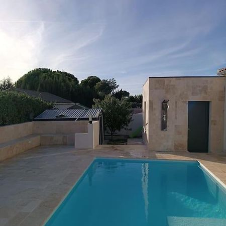 Charmant Studio Avec Piscine Villemoustaussou Bagian luar foto